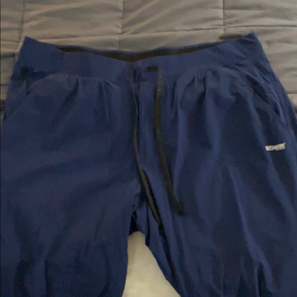 Dark blue Grey’s Anatomy Men’s scrub pants.